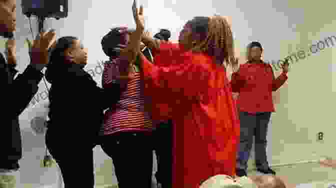 A Preacher Laying His Hands On A Woman's Head The Laying On Of Hands (Understanding Spirituals)