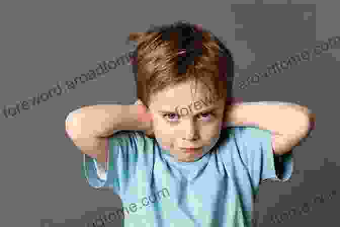 A Young Child Pouting And Looking Away, Displaying Defiant Behavior PARENTAL GUIDE ON OPPOSITIONAL DEFIANT DISFree Download : An Effective And Ultimate Guide On Propositional Defiant DisFree Download For Parents And Teens