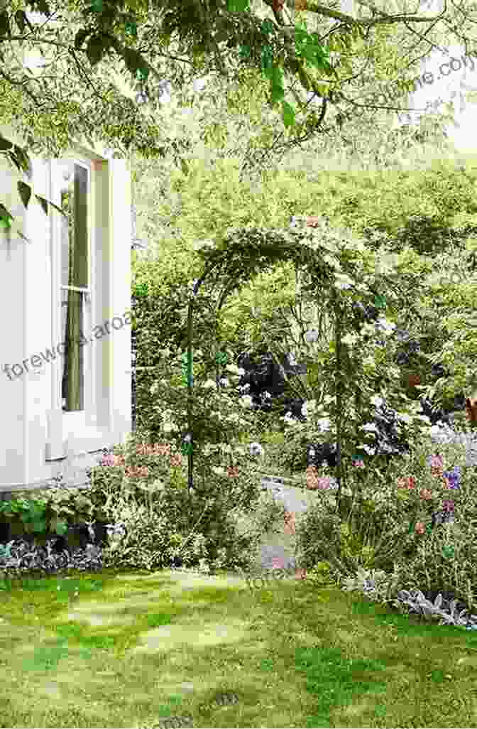 Book Cover Of The Garden El Jardin, Featuring A Lush Garden With Vibrant Flowers And A Woman Reading Beneath A Tree THE GARDEN EL JARDIN: (Picture ): First Words English/Spanish Spanish/English Garden Flowers And Nature (Bedtime Stories Bilingual Children S Collection) (Binlingual For Children)