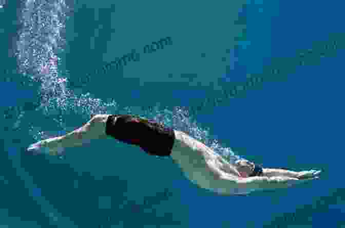 Swimmer Performing A Dolphin Kick Underwater TEACH YOURSELF TO SWIM USING SIX NEW TEACHING METHODS: IN ONE MINUTE STEPS